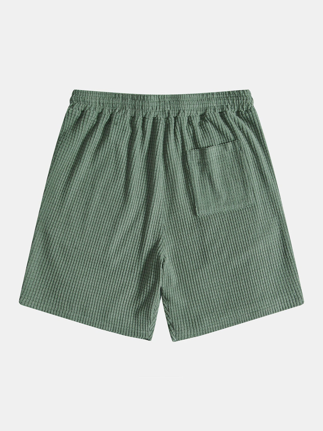 Emma & Rose Manhattan Tucker™ short-sleeved two-piece outfit in green, featuring a stylish top and matching shorts for kids.