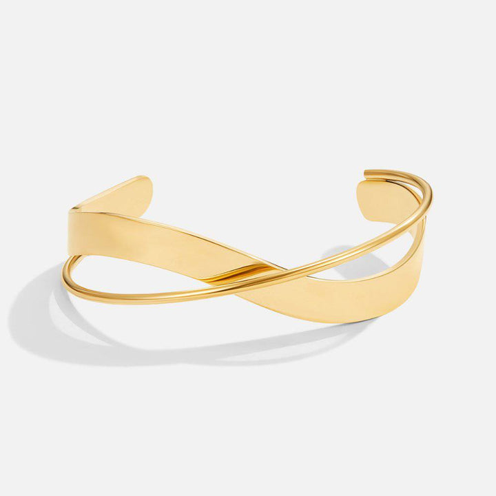 Sophia™ gold bracelet by Emma & Rose Cape Town featuring a stylish, elegant gold bangle with intricate design details.