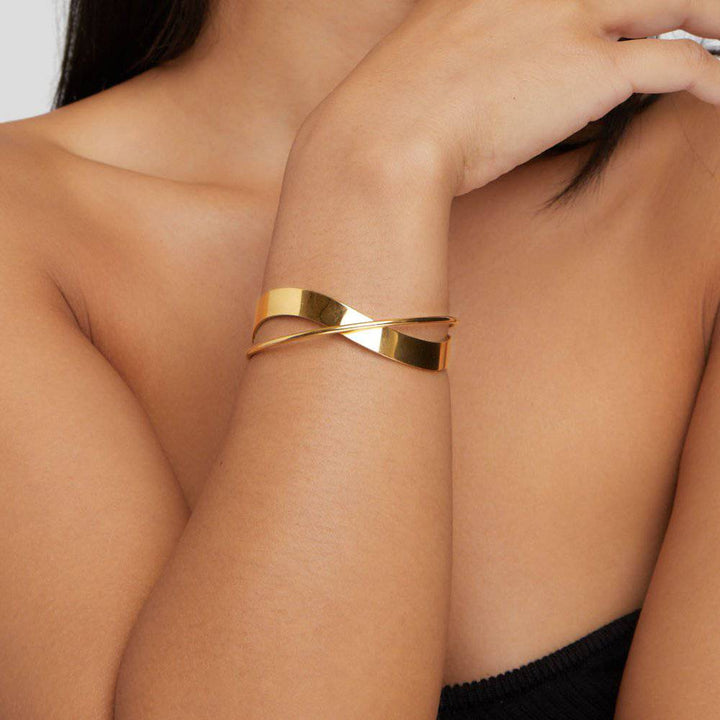 Sophia™ stylish gold bracelet from Emma & Rose Cape Town, featuring a sleek bangle design with a polished finish.