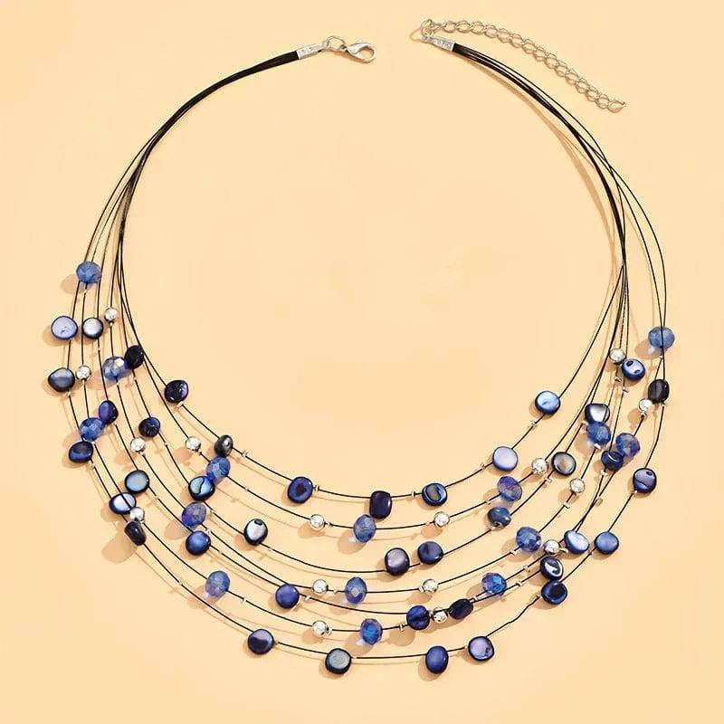 Norheen™ Bohemian Pearl Necklace by Emma & Rose Cape Town featuring layered pearl strands with bohemian style.