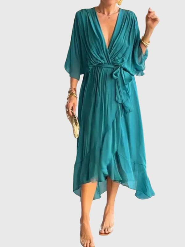 Elegant Bethany™ dress by Emma & Rose Cape Town, featuring a stylish design and flowing fabric, displayed on a mannequin.