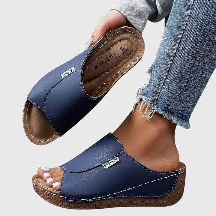 Esther™ Emma & Rose Cape Town orthopaedic wedge sandals with cushioned straps and supportive sole, worn by a person outdoors