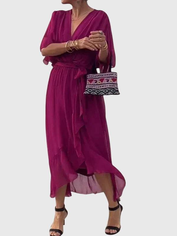 Elegant Bethany dress by Emma & Rose Cape Town, showcasing a flowing fabric and stylish design.