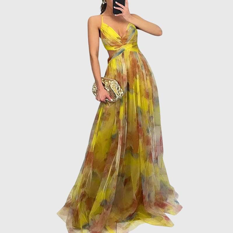 Emma & Rose Cape Town Giselle™ floral maxi dress with a flowing silhouette and colorful floral pattern, perfect for summer wear.