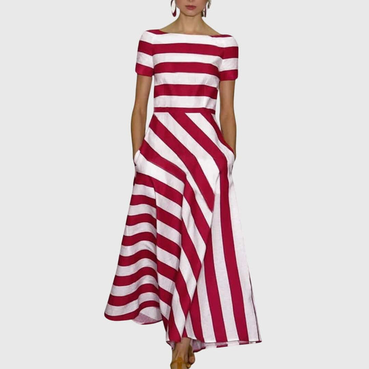 Emma & Rose Cape Town Carly™ striped dress featuring a stylish, fitted design with blue and white horizontal stripes.