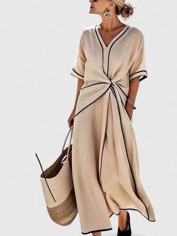 Elegant Erykahhh™ dress by Emma & Rose Cape Town featuring a flowing, stylish design perfect for formal occasions.