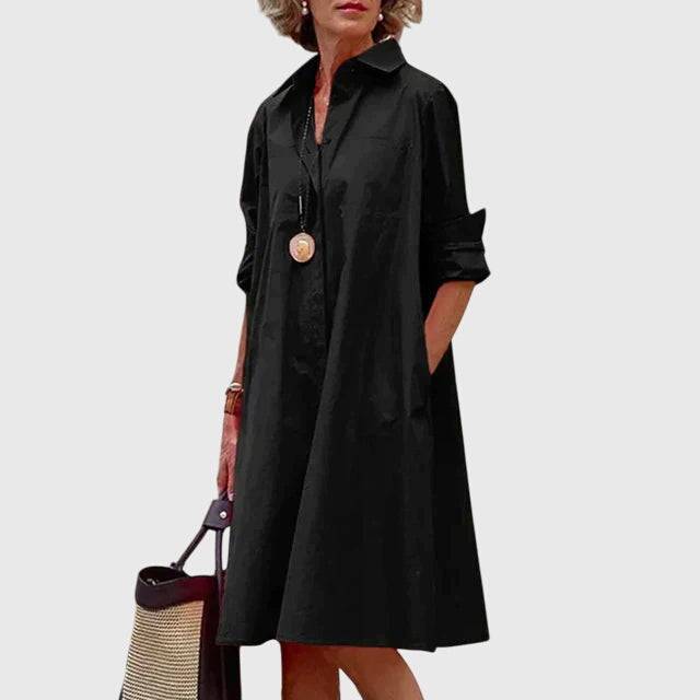 Emma & Rose Cape Town Paige™ elegant dress with functional pockets, shown in a stylish design with detailed fabric and pocket features.