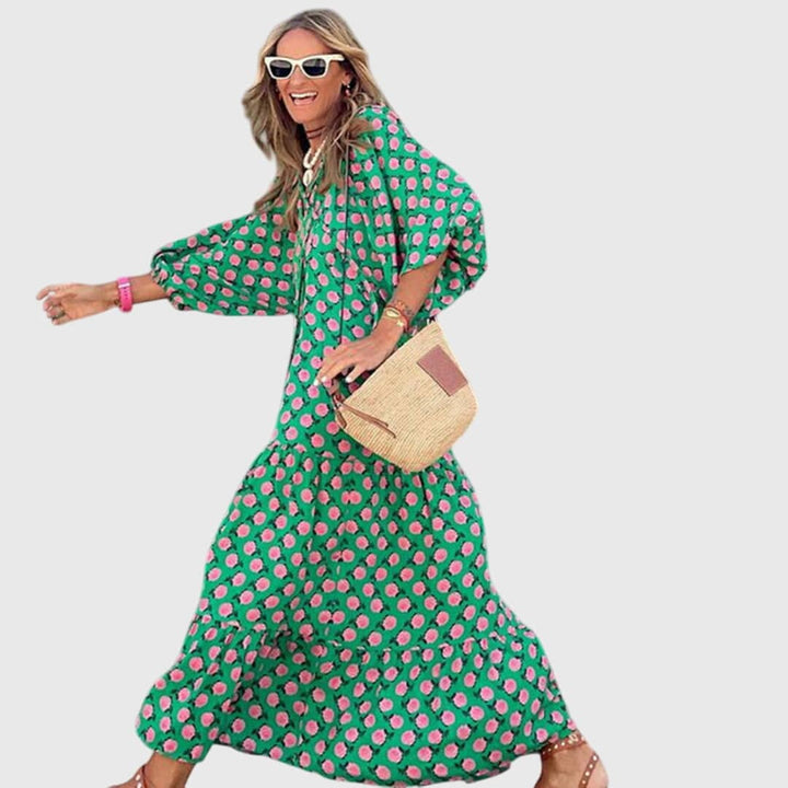 Sarah™ boho maxi dress by Emma & Rose Cape Town, flowing fabric with floral patterns and a relaxed, bohemian style.