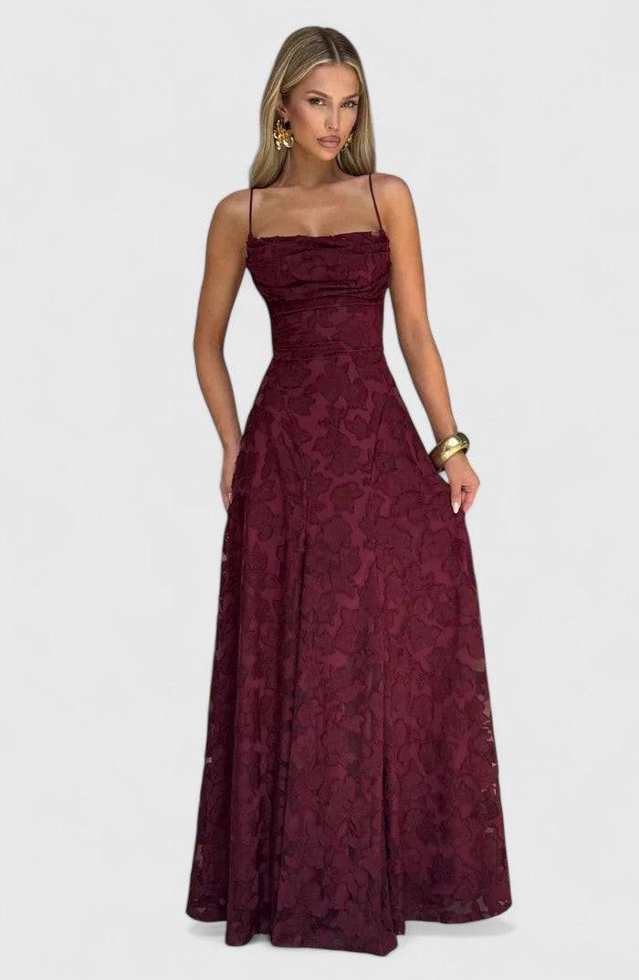 Gwenn™ elegant maxi dress by Emma & Rose Cape Town, flowing fabric, V-neckline, and sleeveless design showcased in the image.