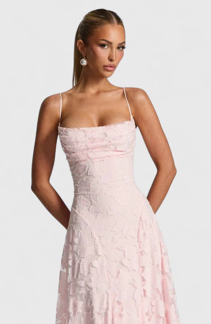 Gwenn™ elegant maxi dress by Emma & Rose Cape Town, flowing fabric, V-neckline, and sleeveless design for a stylish summer look.