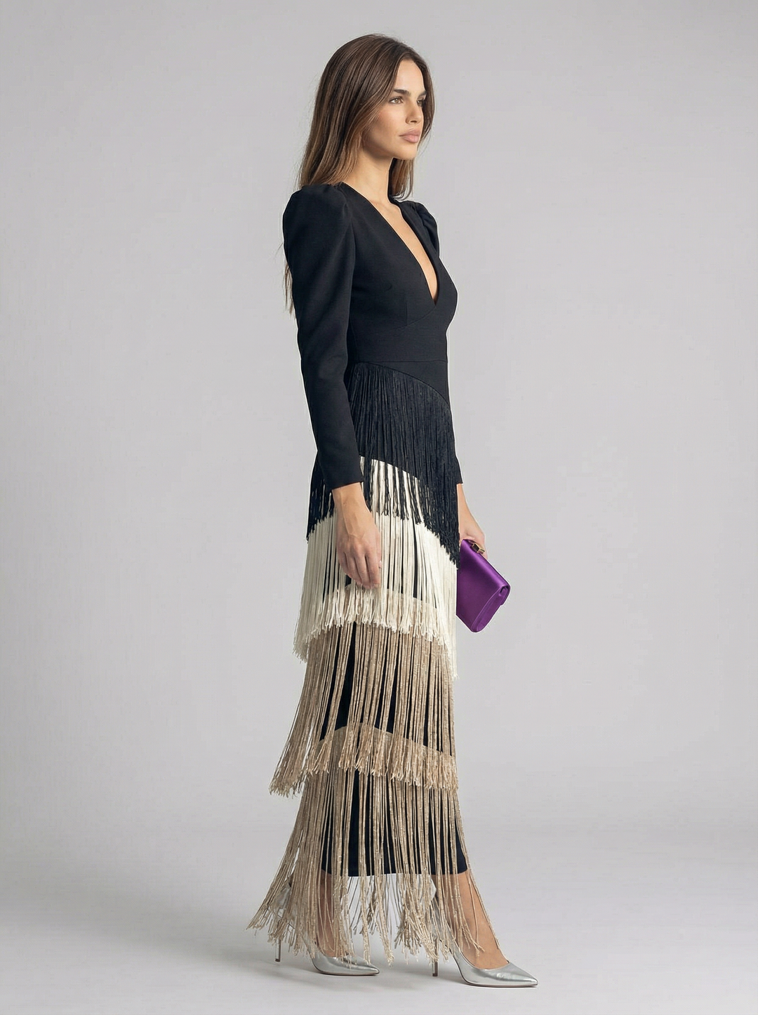 Elegant sage green fringe dress by Emma & Rose Cape Town, featuring flowing fabric and stylish fringe details for high-end fashion.