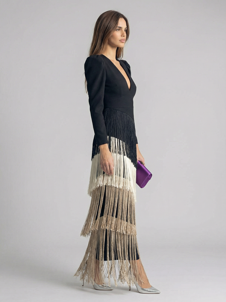 Elegant sage green fringe dress by Emma & Rose Cape Town, featuring flowing fabric and stylish fringe details for high-end fashion.