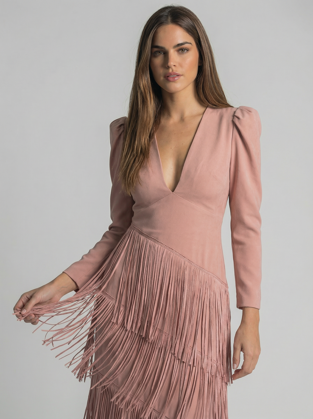 Elegant sage green fringe dress by Emma & Rose Cape Town, featuring flowing fabric and stylish fringe details.