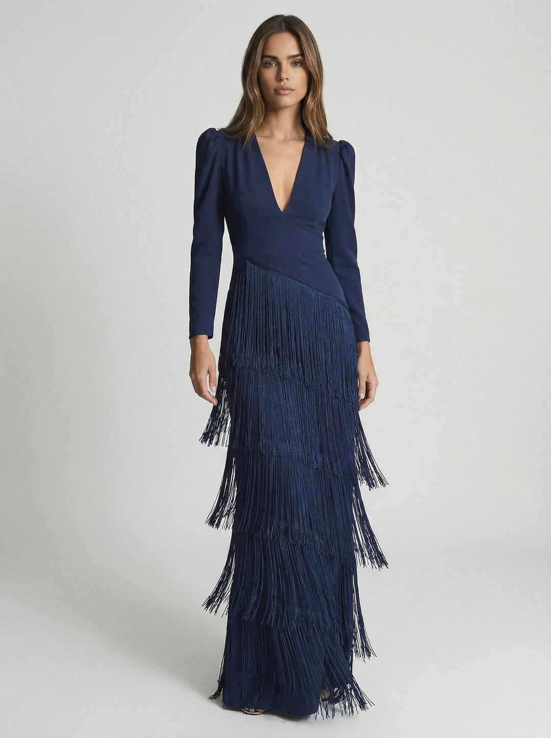 Sage green fringe dress by Emma & Rose Cape Town featuring flowing fabric and stylish fringe details.