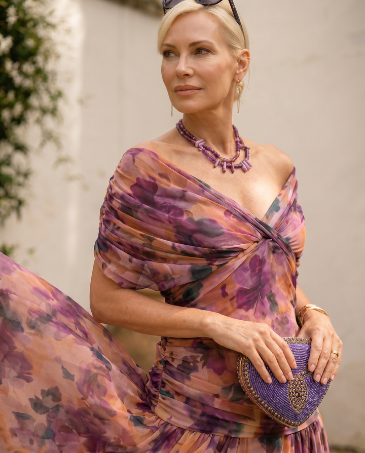 Elegant maxi dress for parties by Emma & Rose Cape Town featuring a sweetheart neckline and flowing fabric.