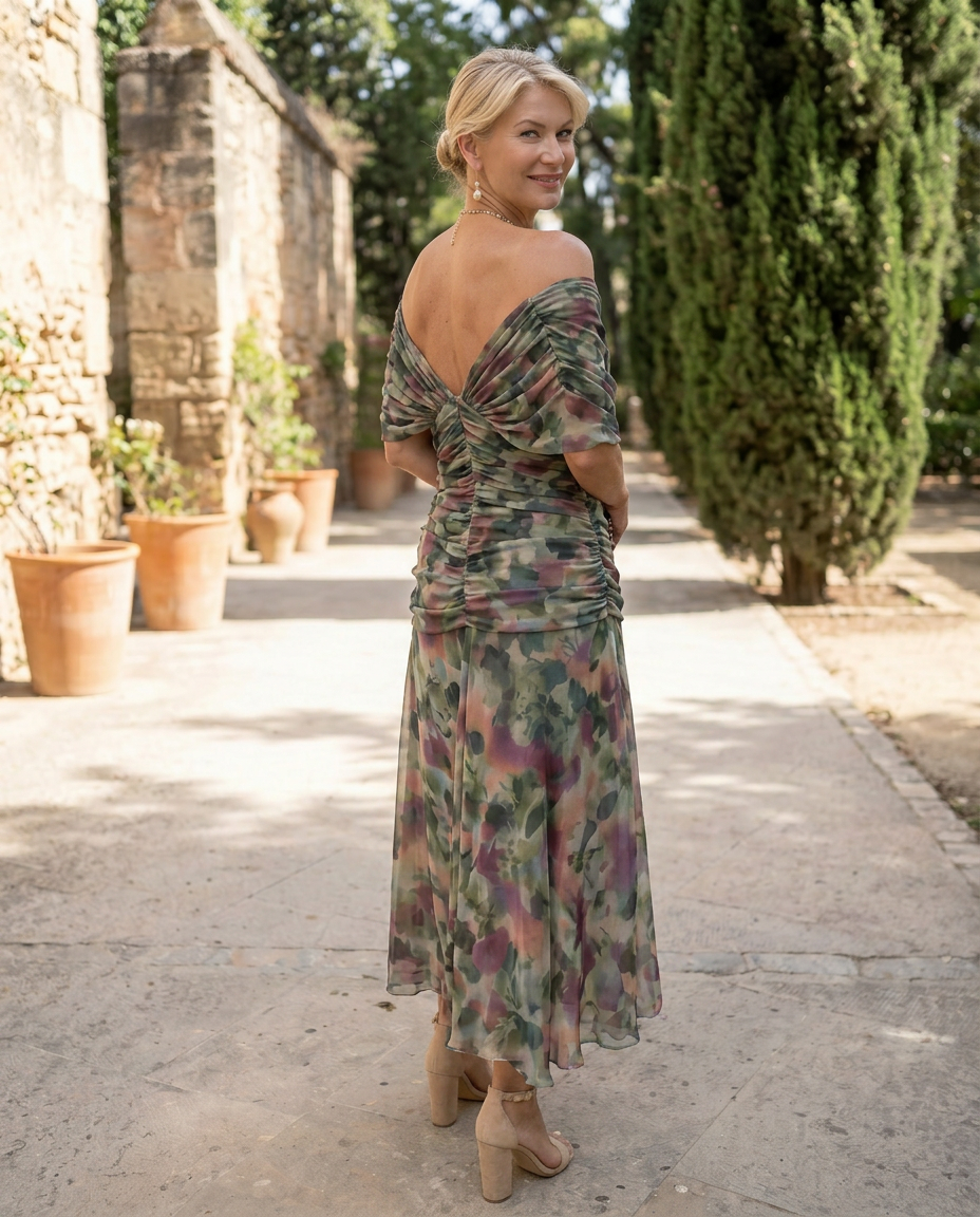 Elegant maxi dress with sweetheart neckline by Emma & Rose Cape Town, shown in a photorealistic high-resolution fashion image.