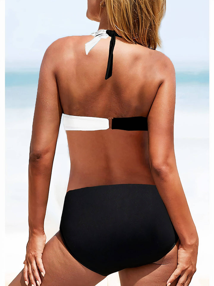 Sea Breeze bikini set by Emma & Rose Manhattan featuring a stylish blue and white patterned two-piece swimwear on a model.