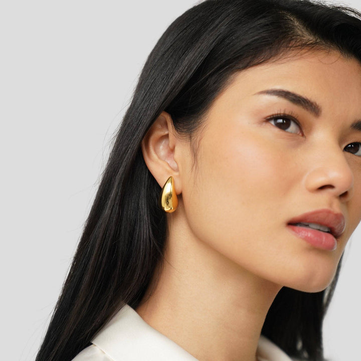 Luna™ Stiliga Gold Earrings by Emma & Rose Cape Town, gold teardrop-shaped earrings with elegant design and polished finish.
