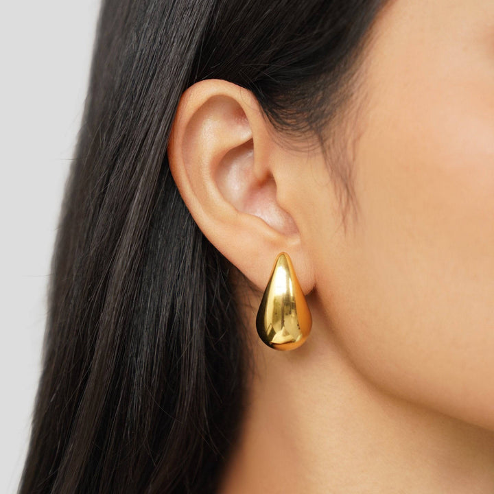 Emma & Rose Cape Town Luna™ Stiliga Gold Earrings with teardrop design and elegant gold finish.