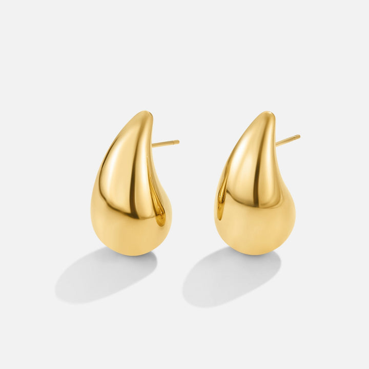 Emma & Rose Cape Town Luna™ Stiliga Gold Earrings featuring elegant teardrop-shaped gold earrings.