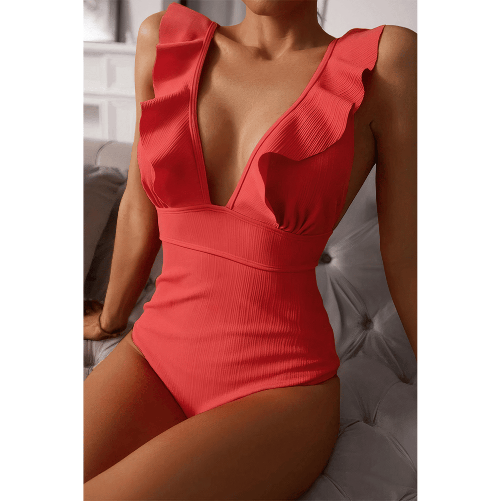 Gold Olivia™ Mirage Swimsuit by Emma & Rose Manhattan, featuring a stylish one-piece design with a flattering cut.