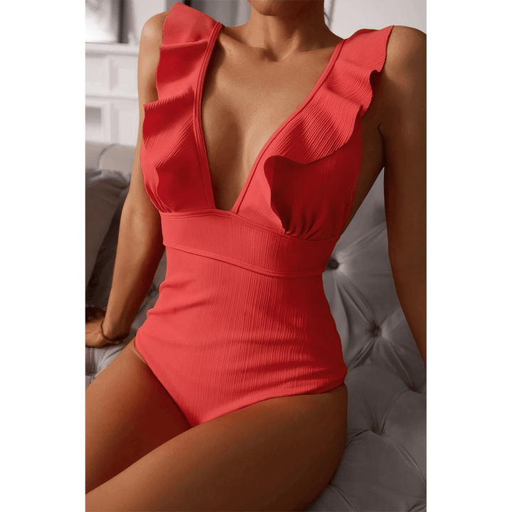 Gold Olivia™ Mirage Swimsuit by Emma & Rose Manhattan, featuring a stylish one-piece design with a flattering cut.