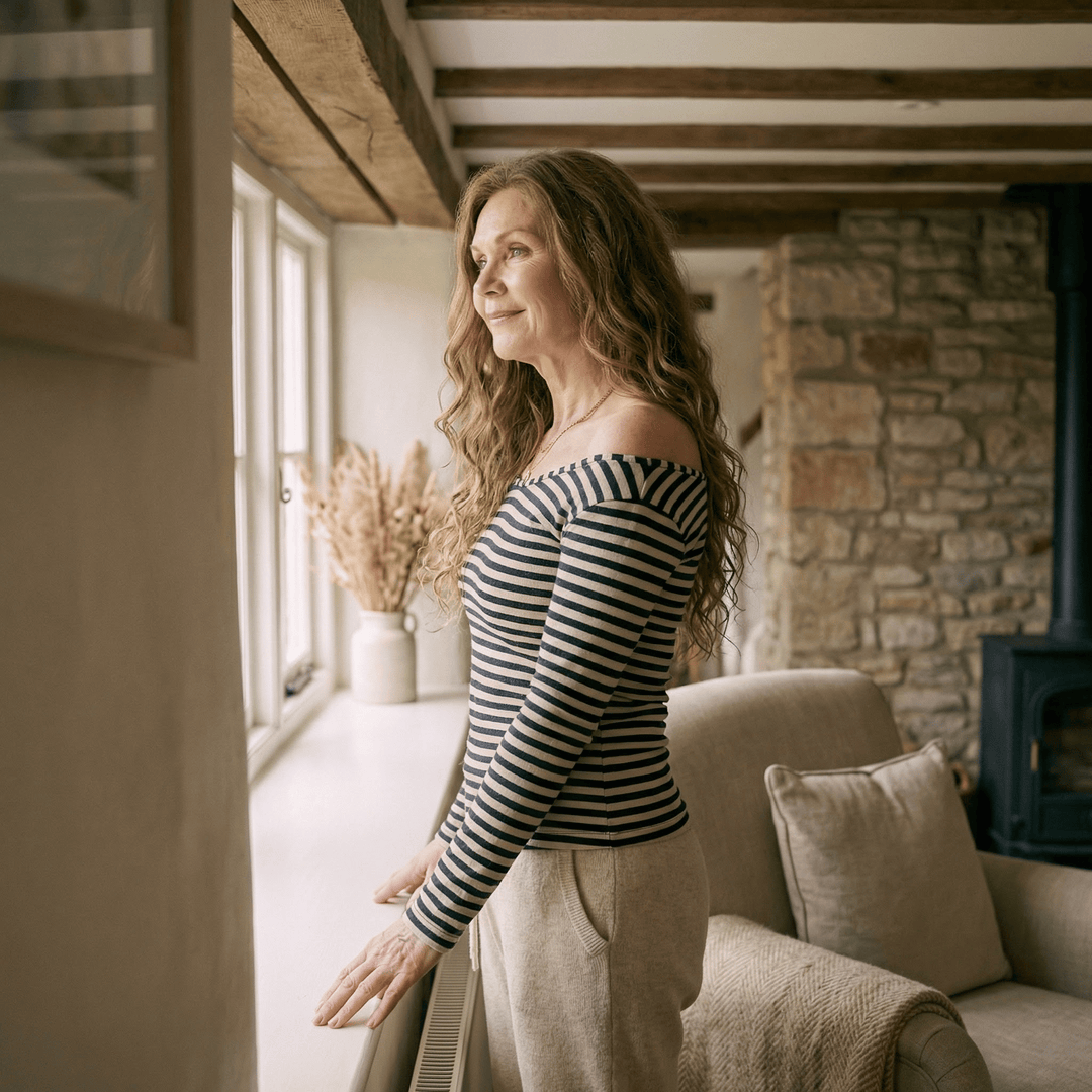 Striped slim patchwork top by Emma & Rose Manhattan, featuring a fitted design and bold pattern, shown on a model.