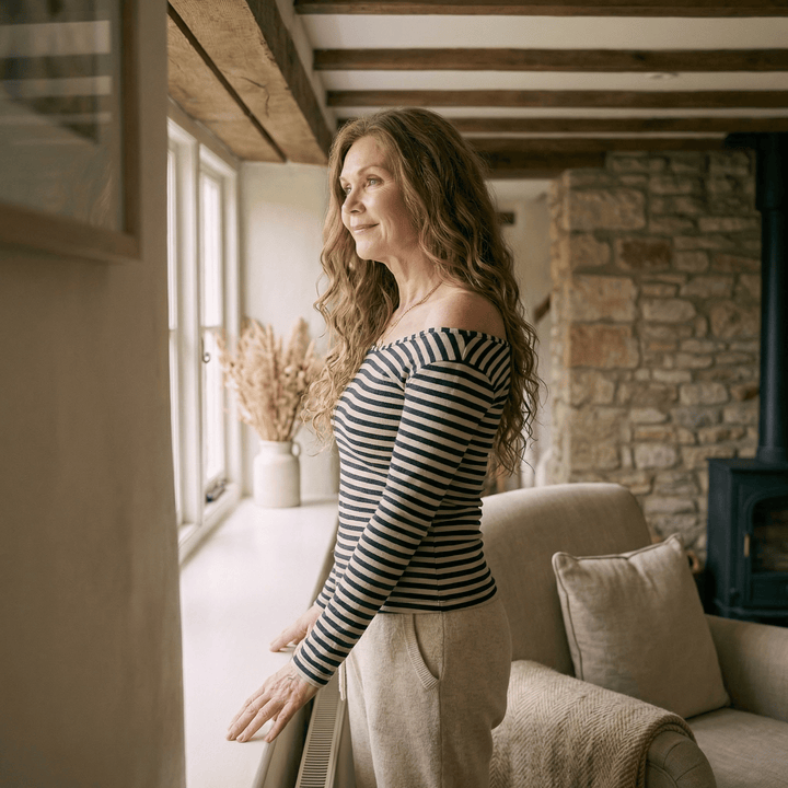 Striped slim patchwork top by Emma & Rose Manhattan, featuring a fitted design and bold pattern, shown on a model.