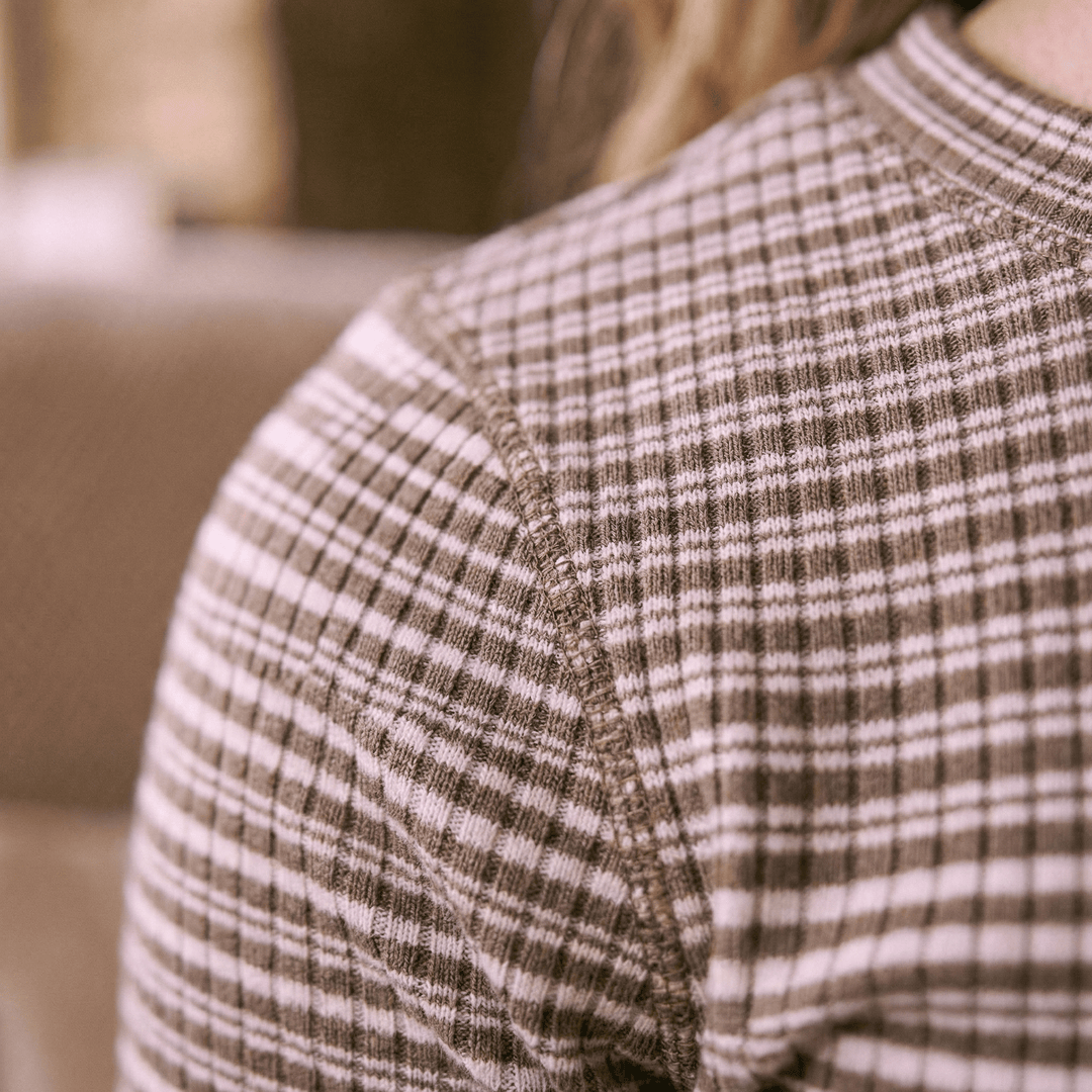 Emma & Rose Manhattan Amelia™ stripe long sleeve top with navy and white horizontal stripes, displayed on a plain background.