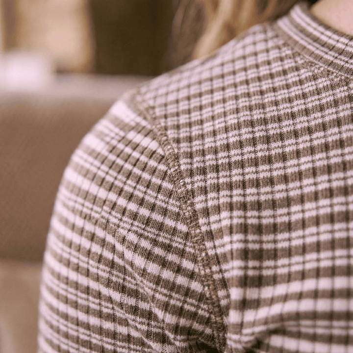 Emma & Rose Manhattan Amelia™ stripe long sleeve top with navy and white horizontal stripes, displayed on a plain background.