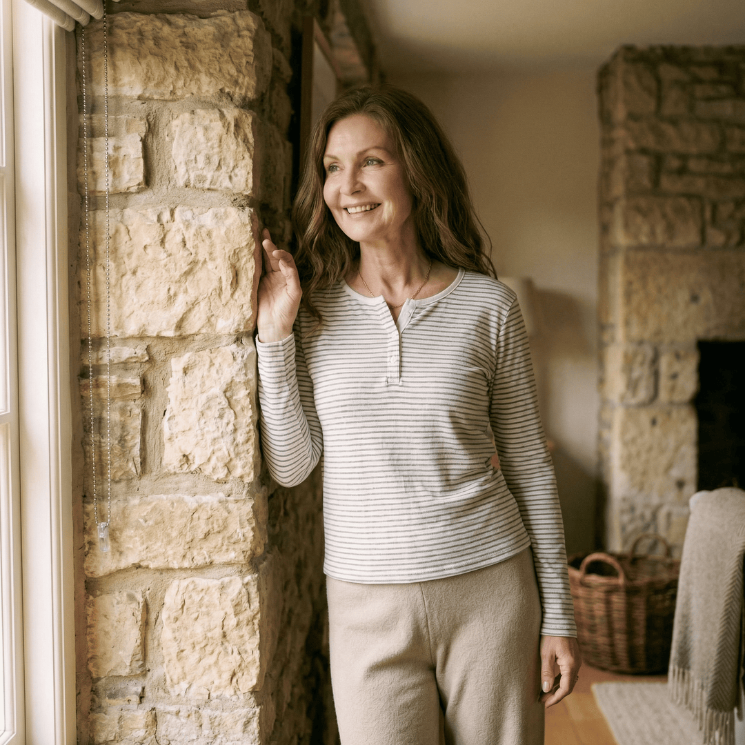 Emma & Rose Manhattan Sienna™ stripe long sleeve top with a fitted design and classic pattern, shown on a model.