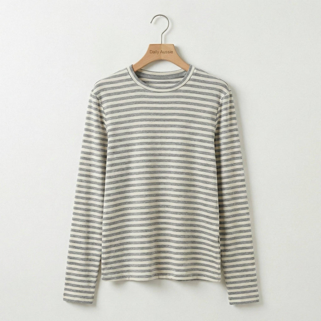 Emma & Rose Manhattan Amelia™ stripe long sleeve top, featuring a stylish striped pattern and comfortable fit, shown on a model.