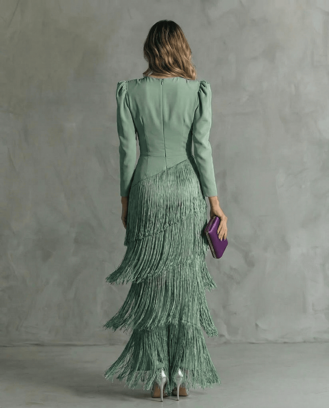 Elegant Emma & Rose Durban Clara™ midi dress with a fitted bodice and flowing skirt, displayed on a hanger against a neutral background.