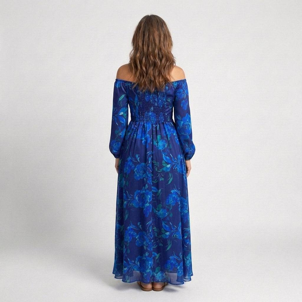 Aspen™ shoulder floral maxi dress by Emma & Rose Cape Town, featuring a flowing fabric with vibrant floral patterns and shoulder details.