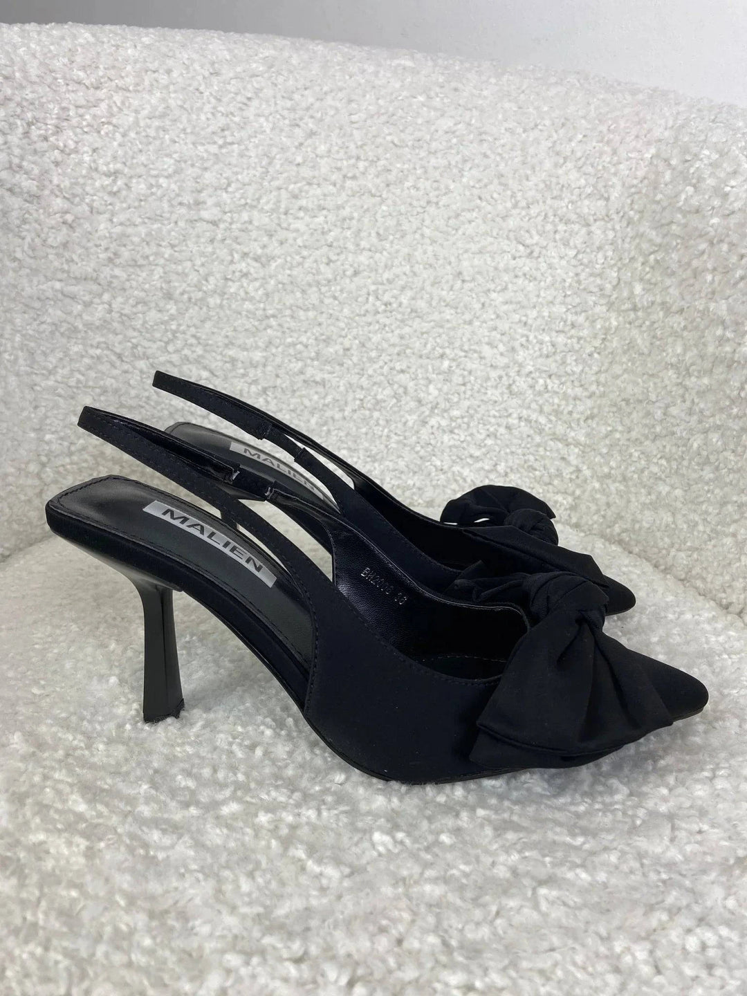 Emma & Rose Cape Town Talita™ slingback bow shoes with a sleek design and elegant bow detail, perfect for stylish occasions.