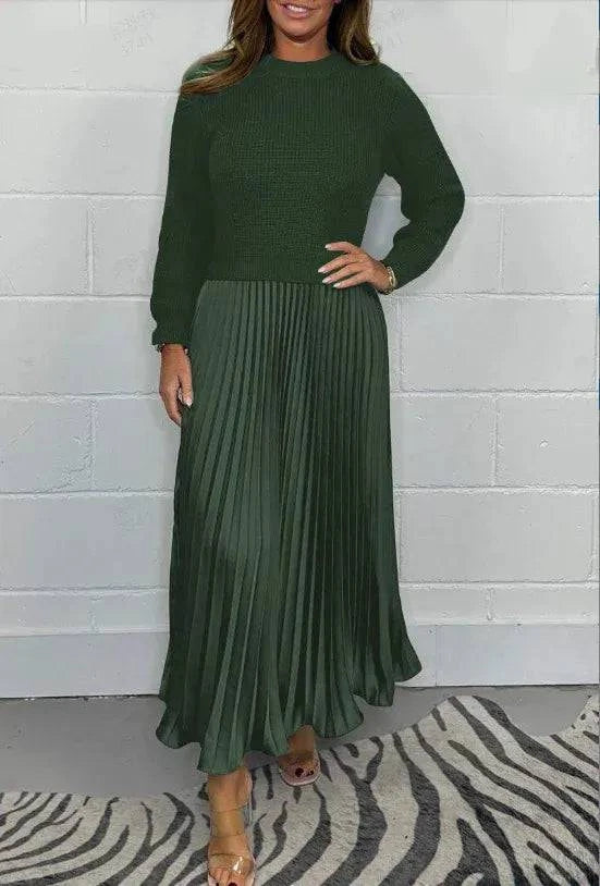 Elegant Maeliq™ maxi dress by Emma & Rose Cape Town, featuring flowing fabric and stylish design, displayed on a hanger.