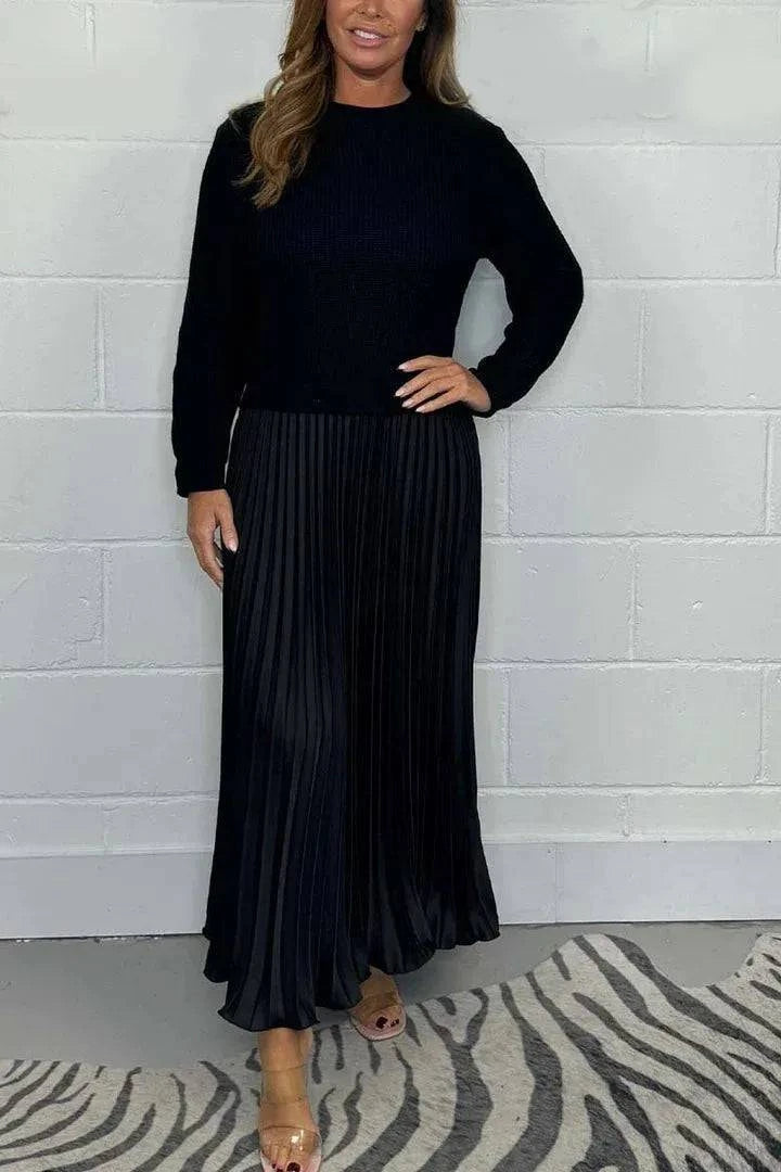 Elegant Maeliq™ maxi dress by Emma & Rose Cape Town, flowing fabric with intricate detailing, perfect for formal occasions.