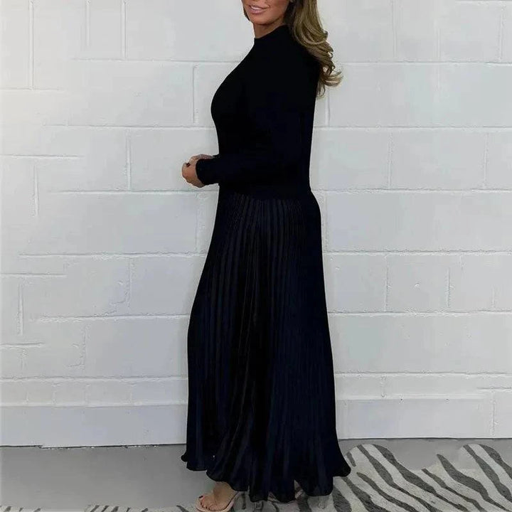 Elegant Maeliq maxi dress by Emma & Rose Cape Town featuring flowing fabric and a sophisticated silhouette.
