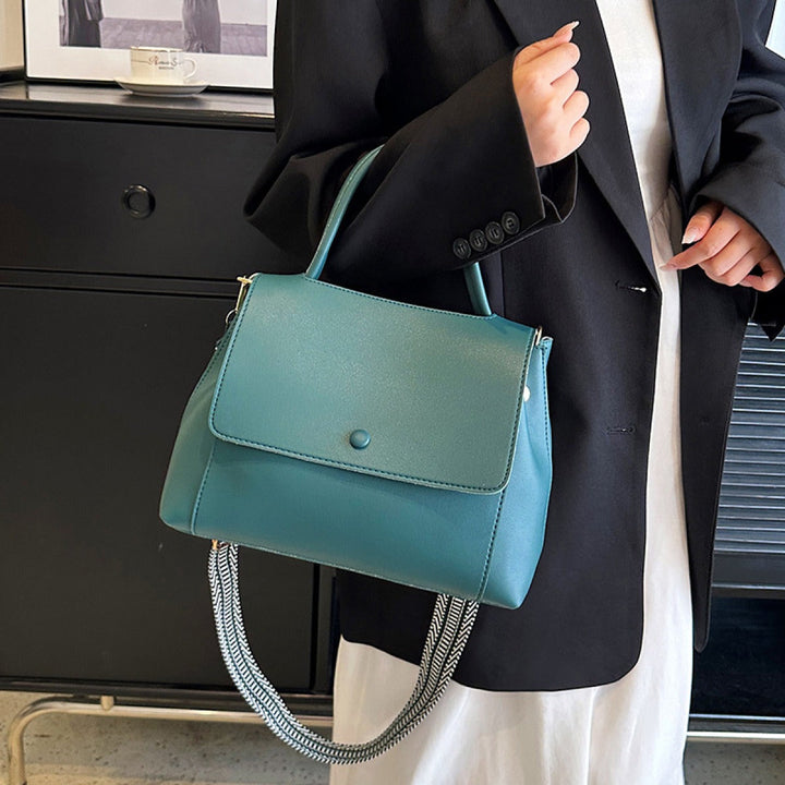 Synthetic leather handbag with structured design in crossbody style - Renata