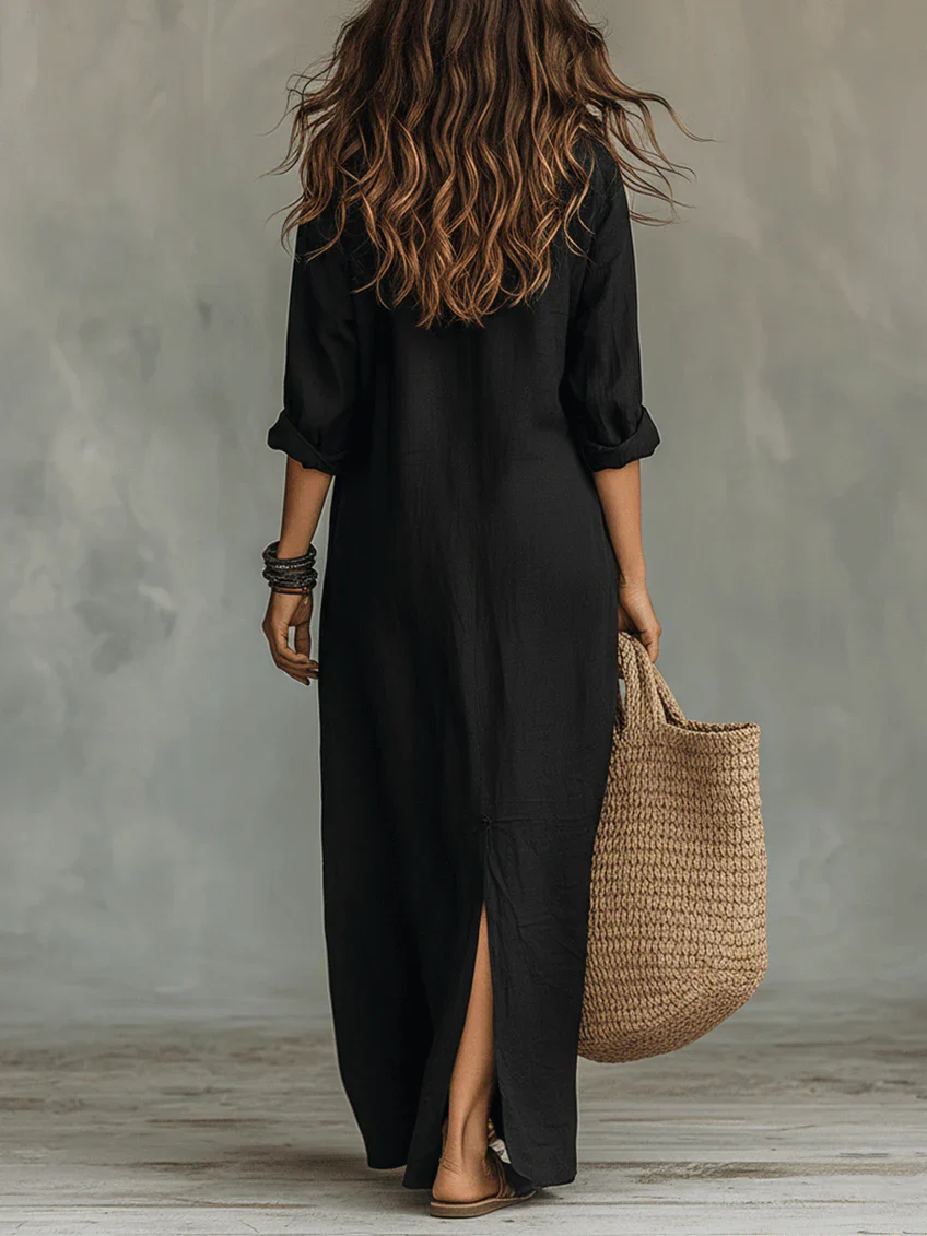 Elegant summer maxi dress by Emma & Rose Cape Town featuring flowing fabric and a stylish design.