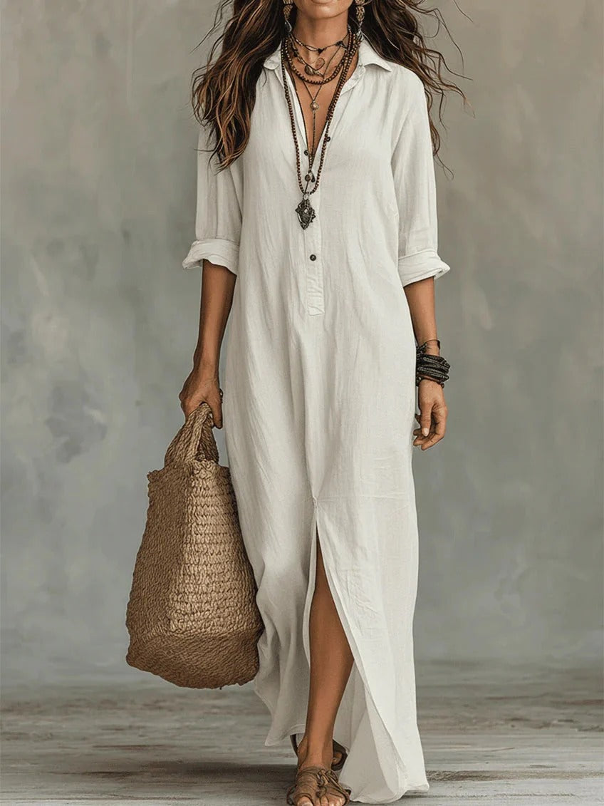 Elegant Emma & Rose Cape Town Willow summer maxi dress with floral pattern and flowing fabric for warm weather wear.