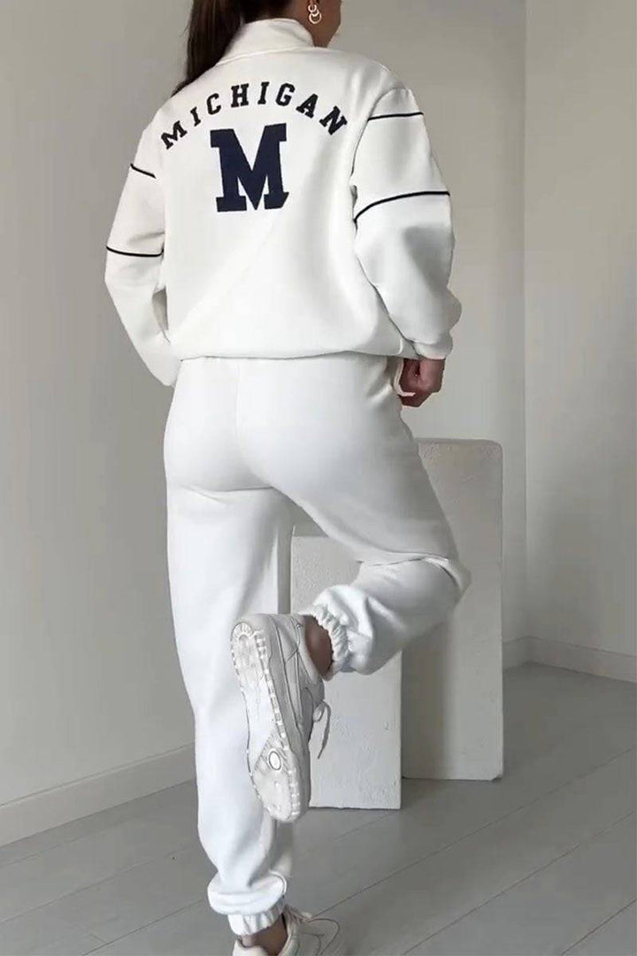 Thalynnae™ sweater and trousers set by Emma & Rose Cape Town, featuring a cozy knit sweater and matching tailored trousers.