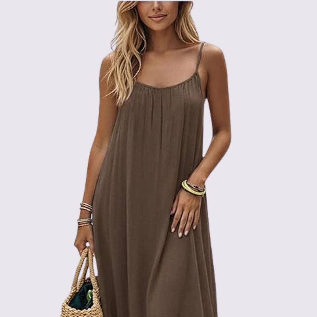 Emma & Rose Cape Town Nuance Dress La Câline, elegant women's dress with flowing fabric and intricate detailing.
