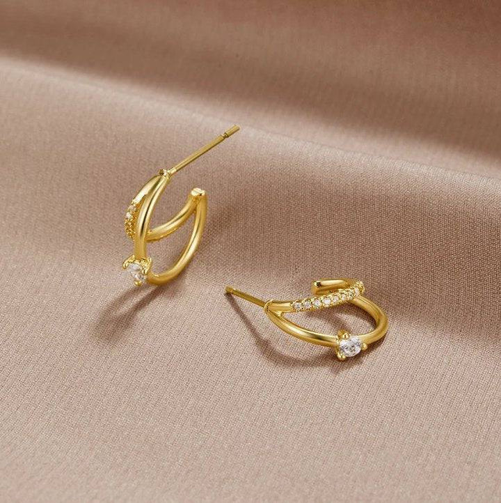 Jenny™ Elegant Crystal Earrings by Emma & Rose Cape Town, gold hoop earrings with layered sparkling crystals.