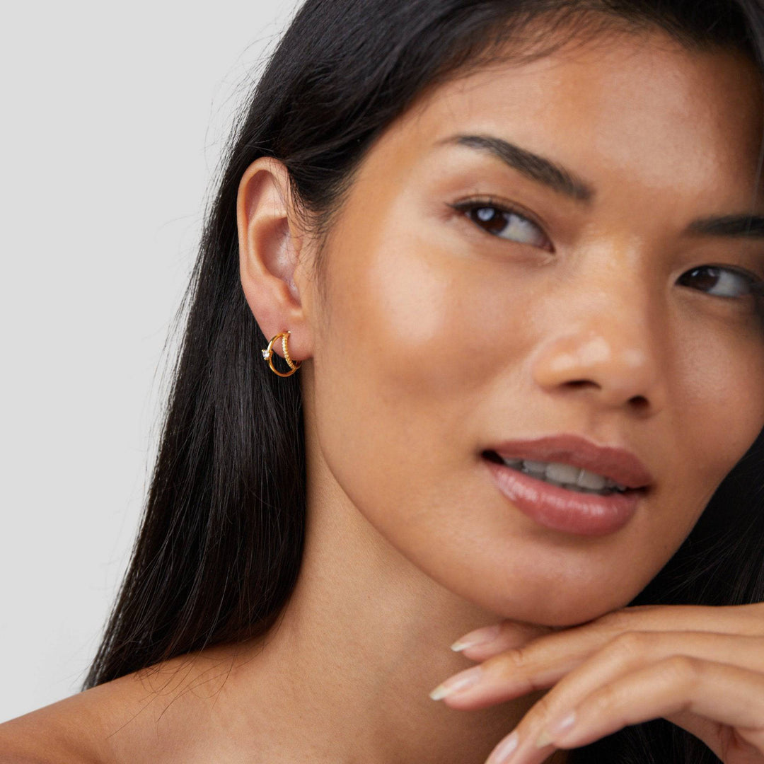 Emma & Rose Cape Town Jenny™ elegant crystal earrings featuring layered crystal accents and gold hoop design.