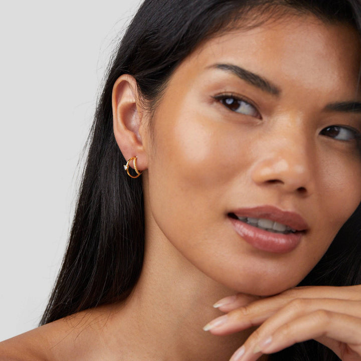 Emma & Rose Cape Town Jenny™ elegant crystal earrings featuring layered crystal accents and gold hoop design.