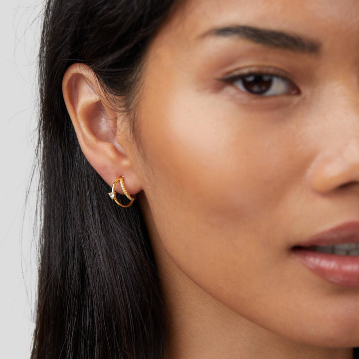 Layered gold hoop earrings with sparkling crystal accents from Emma & Rose Cape Town's Jenny Elegant Crystal Earrings collection
