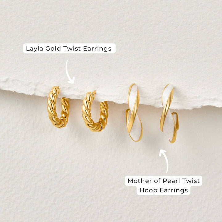Gold twist earrings from Emma & Rose Cape Town, stylish Krystal™ Layla earrings with a twisted design, shown on a white background.