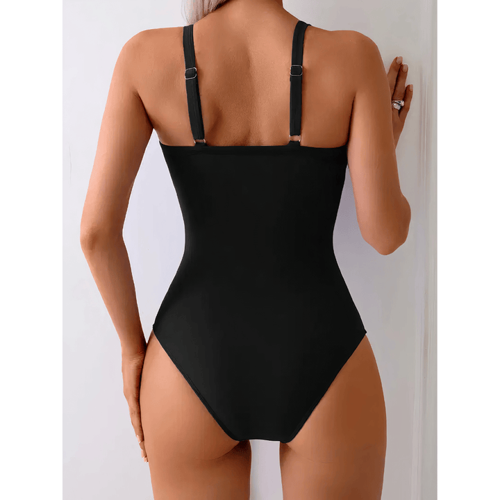 Leopard print V-shaped luxury swimsuit by Emma & Rose Manhattan featuring a stylish cut and bold animal pattern.