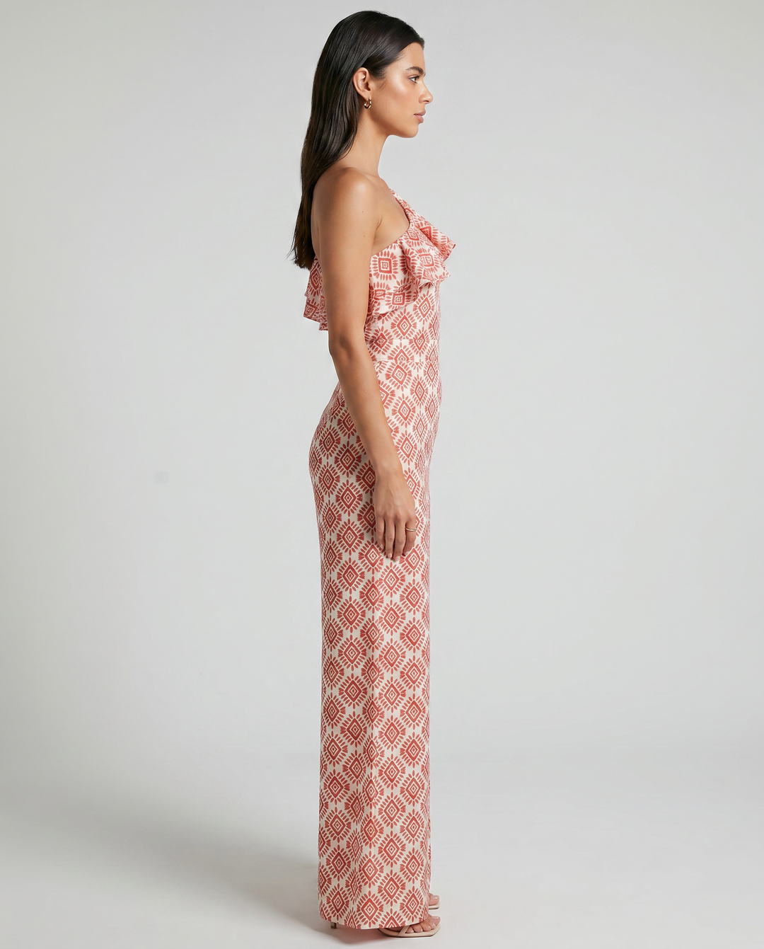 Jimena spring geometric print jumpsuit by Emma & Rose Cape Town, showcasing stylish pattern and tailored fit on a model.
